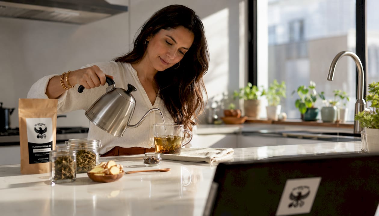 Woman preparing mindful morning herbal tea ritual