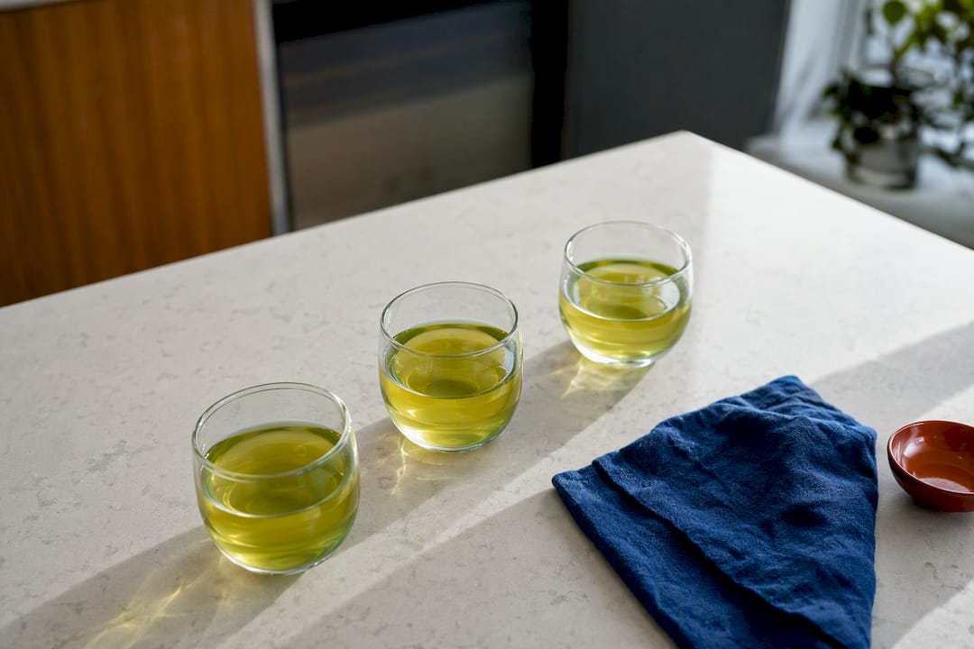 Three cups of brewed green tea